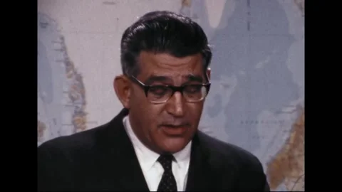 PENTAGON - 1969: EC-121 shootdown briefing — Speaker leans into blue map 動画素材 342569107