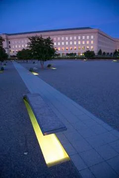 The Pentagon Memorial features 184 empty benches at dusk, a Memorial to Stock Photos