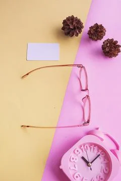 Pentagonal glasses in the photo in minimal summer style on a pastel pink and  Stock Photos