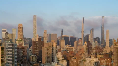 Penumbral Eclipse Moon over Midtown Skyline (2 of 2) Stock Footage 155158879