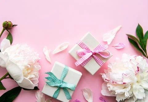 Peonies and gift boxes Stock Photos