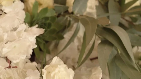 Peonies artificial flowers on the florist's table Video stock 122999703