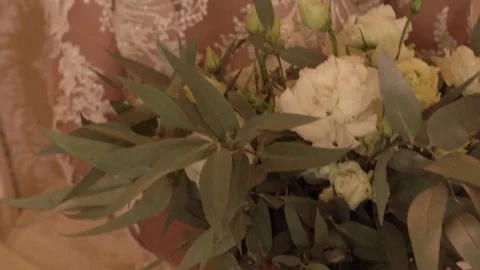 Peonies artificial flowers on the florist's table Video stock 123001930