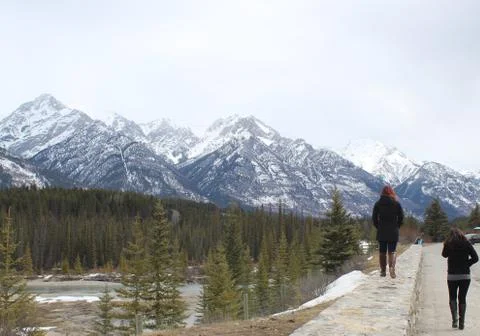 Peope walking with mountains background. Fotos Stock
