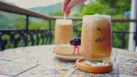 People activity concept with slow motion woman hand during mixing ice coffee Stock Footage 254160616