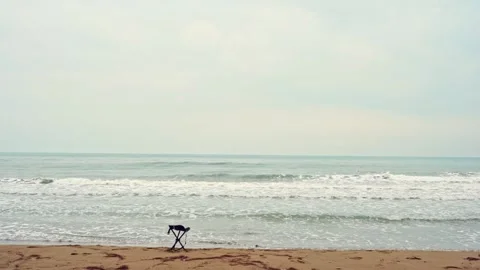 People activity concept with slow motion moving of wave with small chair Stock Footage 254161418