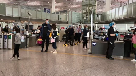 People in airport,Security checkpoint,wearing mask,post covid 19 Stock Footage