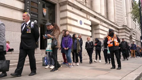 People from all over UK queuing to pay their respects to Her Majesty the Queen Stock Footage 211643411