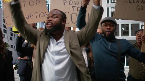 People and activists protesting against corruption during a public march Stock Footage 325918412