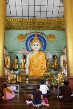 People and buddhas Stock Photos