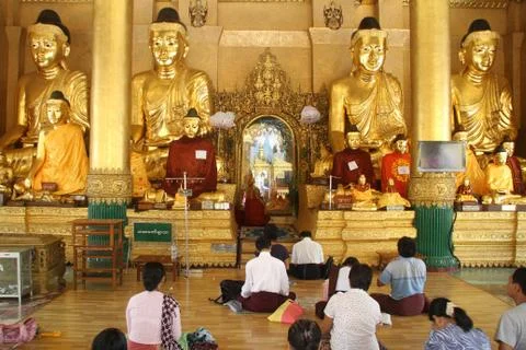 People and buddhas Stock Photos