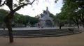 People and dogs walking around the Bartomeu Robert monument in Barcelona 4k or 4k+ Resolution
