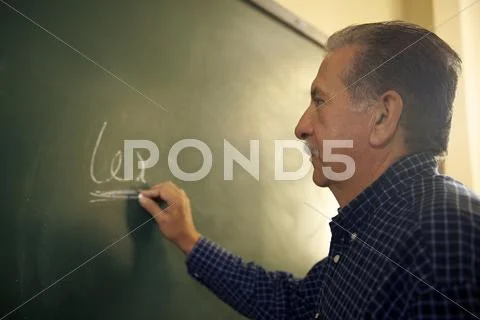 People and education, law teacher writing on blackboard in college Stock Photos