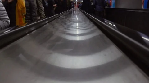 People and escalators in the underground Stock Footage 70552461