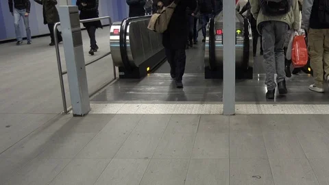 People and escalators in the underground Stock Footage 70738836