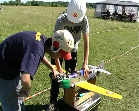 People and a model airplane Stock Footage 11437398
