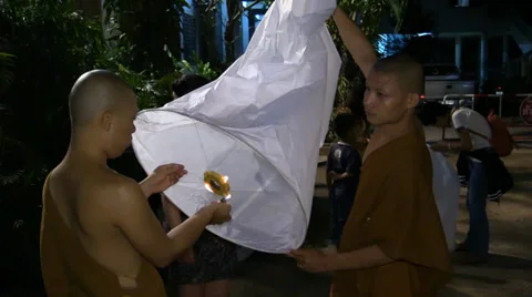 People and monks release sky lanterns at the Temple. Loi Krathong, Chiang mai Stock Footage 34285356