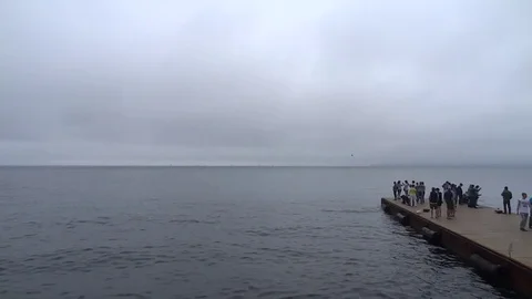 People and pier Vídeo Stock 74750918