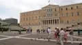 People and pigeons near Parliament in Athens, Greece HD Footage