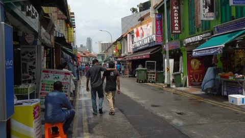 People and Storefronts in Little India District of Singapore Stock Footage 114483473