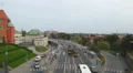 People and traffic on a busy downtown street in Warsaw, Poland. View from above HD Footage
