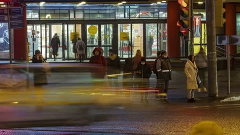People and traffic at a busy intersection at the entrance to the supermarket, Stock Footage 170624298