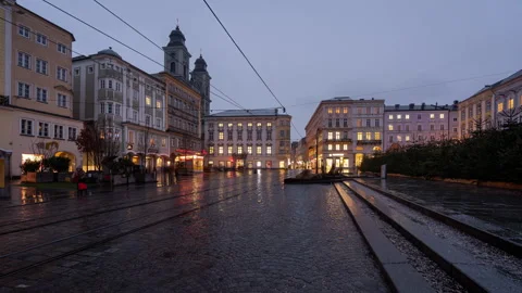 People and trams on the main square in Linz Video stock 311148218