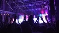 People applauding to music band, amazing atmosphere at music and light show HD Footage