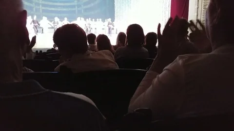 People applause on the performance in the theater. Back view Stock Footage 92149693