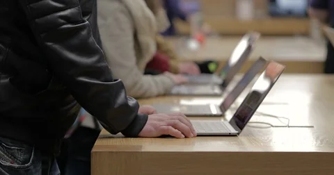 People at a apple store Stock Footage 75451617