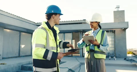 People, architect or high five with electrician on construction site for Stock Footage 345574199