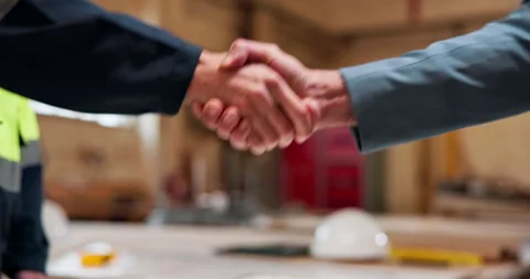 People, architecture and handshake in workshop for building deal, partnership or Stock Footage 337987150