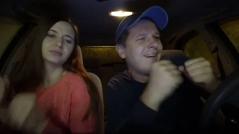 People are dancing in the car. Stock Footage 81628107