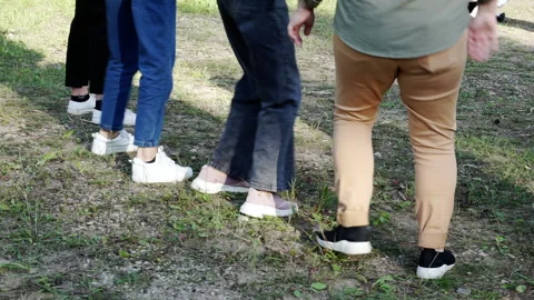 People are dancing on the lawn. Stock Footage 164587812