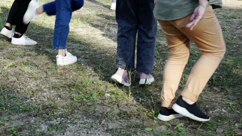 People are dancing on the lawn. Stock Footage 164587947