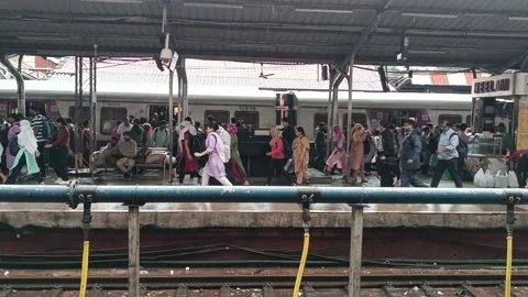 People are getting down the train and walking to start day. Morning scene at Pun Stock Footage 280543225