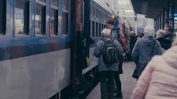 People are getting on the train Stock Footage 85435060