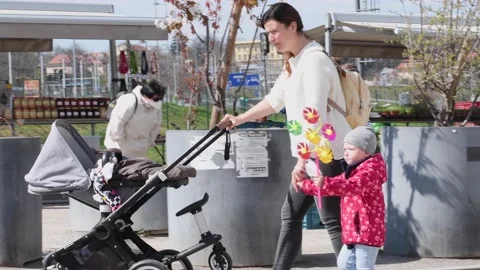 People are having a good time during a nice spring day in Prague at Park Stro Stock Footage 153617787