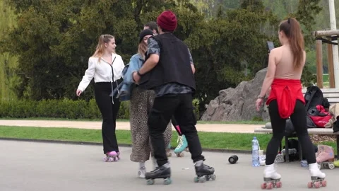 People are having a good time during a nice spring day in Prague at Park Stro Stock Footage 153754811