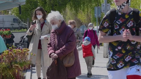 People are having a good time during spring day in Prague at Park Stromavka Stock Footage 153758611
