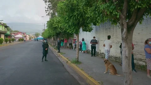 People are lining to vote El Salvador Legislative Elections: February 28, 2021 Stock Footage 149857003