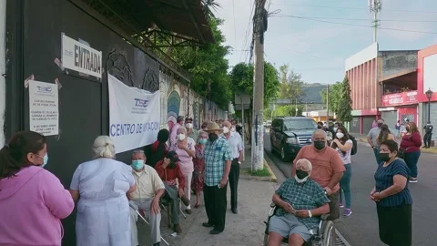 People are lining to vote El Salvador Legislative Elections: February 28, 2021 Stock Footage 149857680
