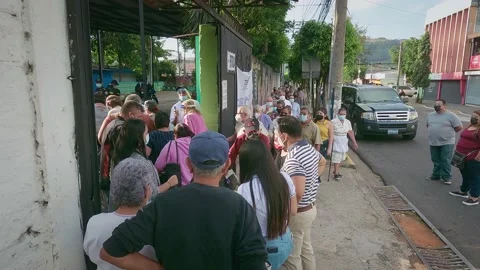 People are lining to vote El Salvador Legislative Elections: February 28, 2021 Stock Footage 150049383