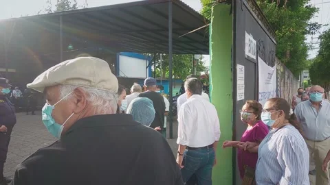 People are lining to vote El Salvador Legislative Elections: February 28, 2021 Stock Footage 150050764