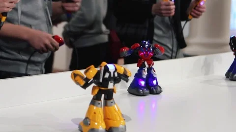  People are playing robots Stockbeeldmateriaal 77828951