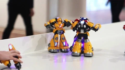  People are playing robots Stockbeeldmateriaal 77829031