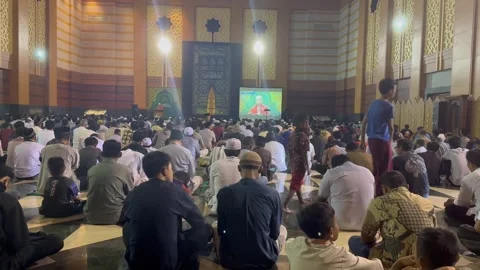People are praying inside the mosque at Jakarta Stock Footage 261131562
