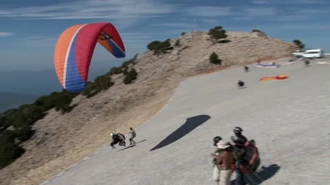 People are preparing for paragliding on Babadag mountain. 스톡 동영상 155163053