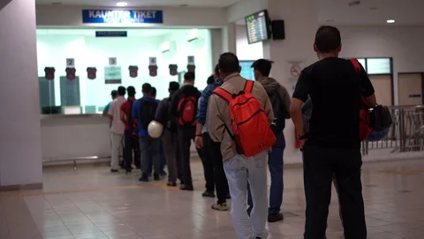 People are queue to buy train ticket at the counter Video stock 110899883