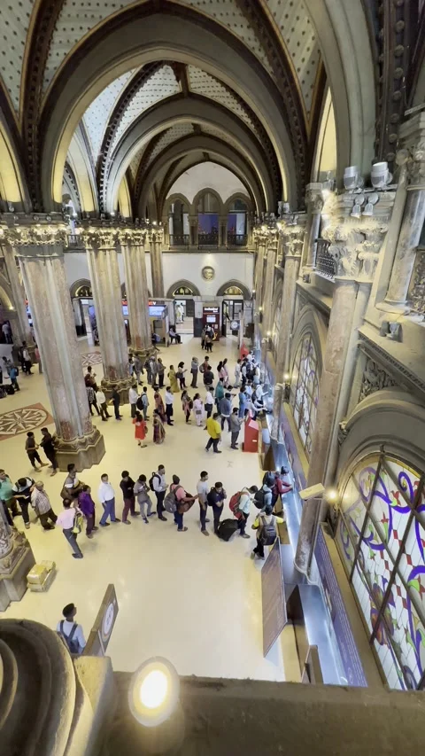 People are in queue for a Local train ticket at CST Station Mumbai. Vertical. Video stock 236100677